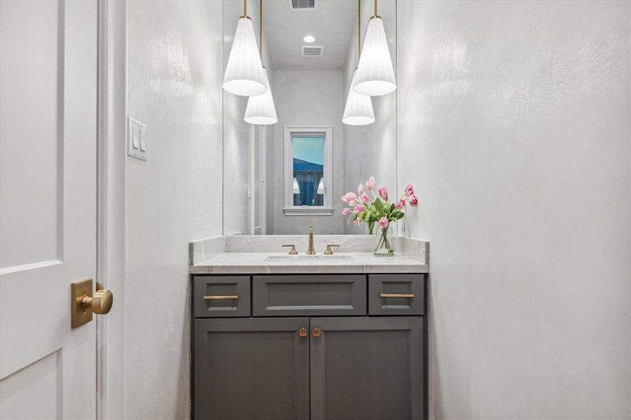 First floor powder bath room... Check out the venetian plastered walls