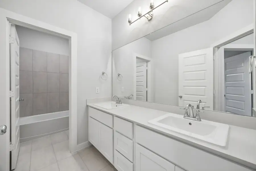 Bathroom in the Winters home plan by Trophy Signature Homes – REPRESENTATIVE PHOTO