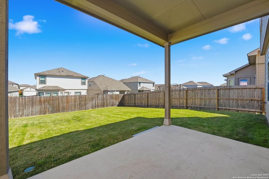 Exterior details and patio area of a home in Abbott Place, St. Hedwig (Image 28).