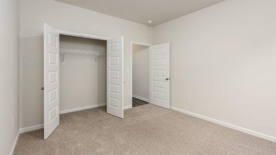 Spacious, unfurnished interior of a new home in Brooks Station, Dacula (Image 19).