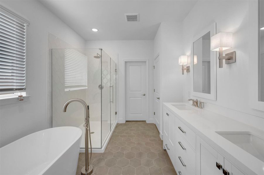 Luxurious primary bath (*Photo not of actual home and used for illustration purposes only.)