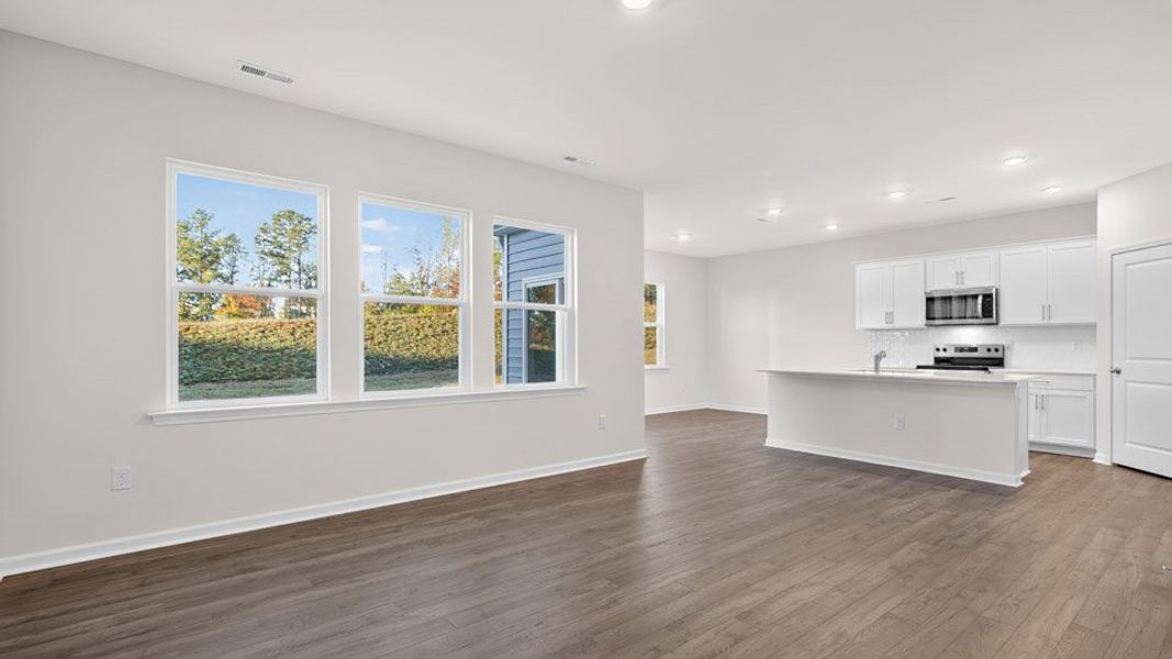 Representative unfurnished interior of a home built from the Darwin by D.R. Horton in The Grove at Matthews Landing, Fuquay Varina (Image 8).