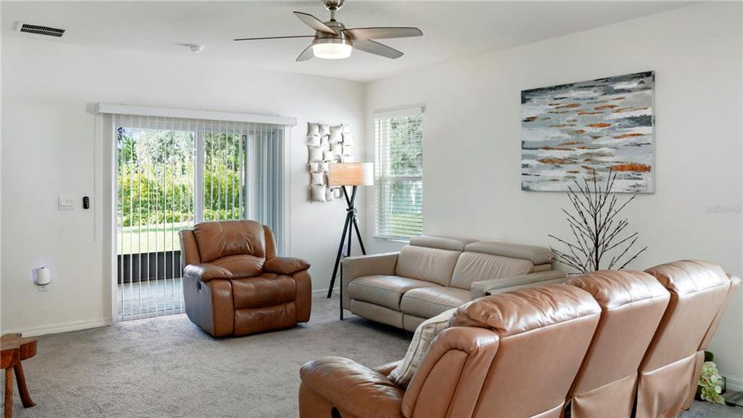 Furnished interior view inside a new home in Charles Cove Express, Davenport (Image 9).