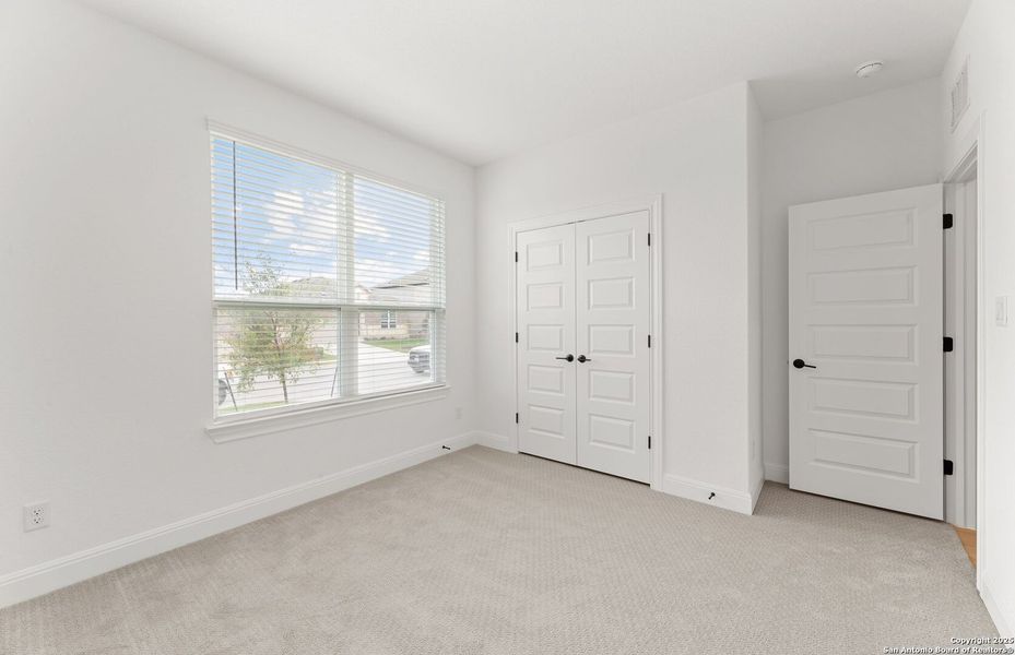 Spacious, unfurnished interior of a new home in Dove Song, Marion (Image 17).