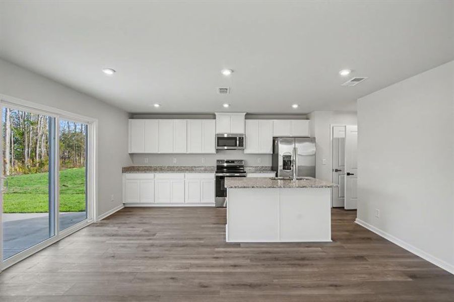 Furnished interior view inside a new home in Sterling Oaks, Ash (Image 3). Furnished interior view inside a new home in Sterling Oaks, Ash (Image 3).