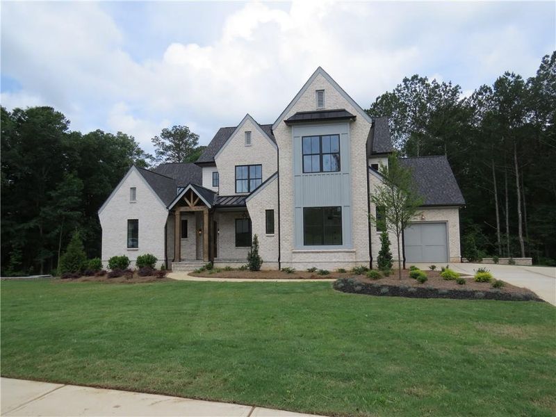Front exterior of a new home in , Acworth, GA, highlighting curb appeal (Image 22).