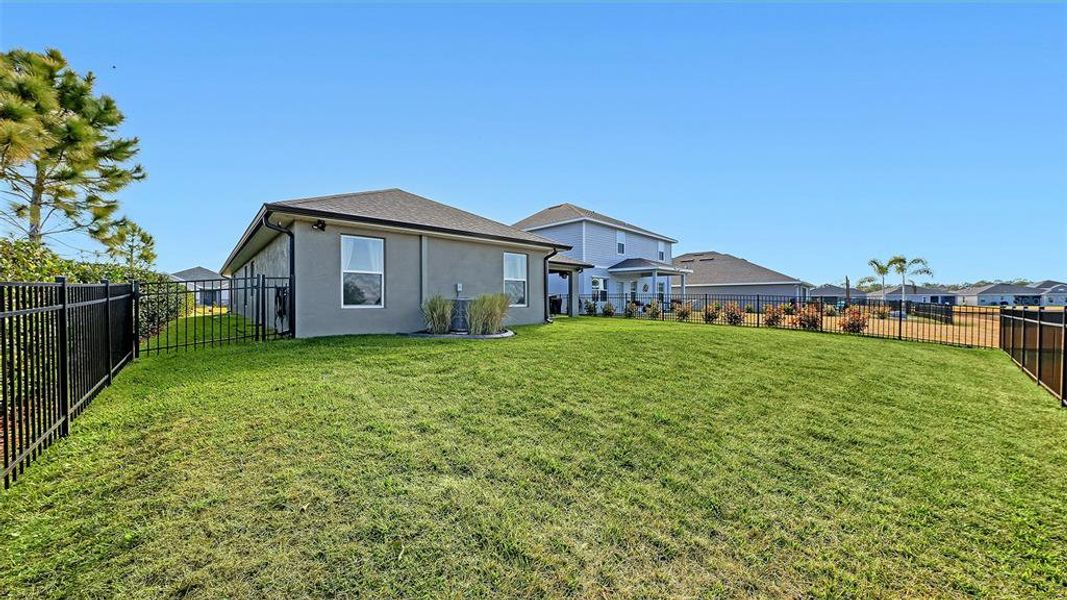Exterior details and patio area of a home in Aviary at Rutland Ranch, Parrish (Image 23).