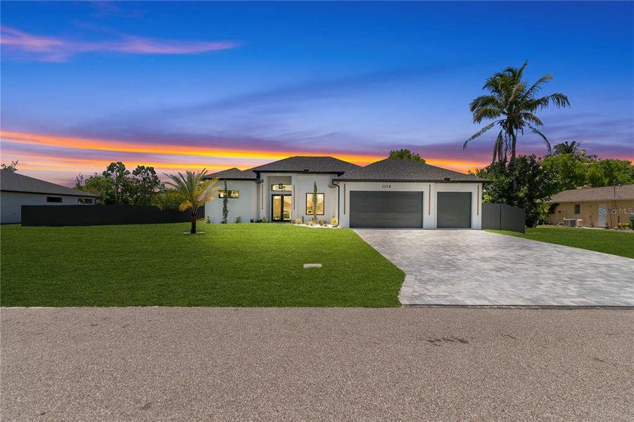 Front exterior of a new home in , Cape Coral, FL, highlighting curb appeal (Image 28).