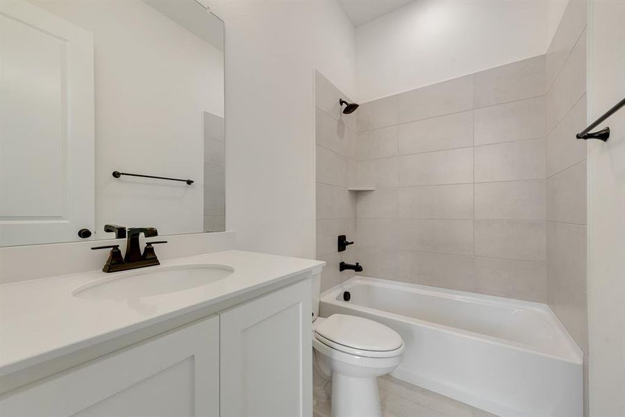 Full bathroom with washtub / shower combination and vanity Full bathroom with washtub / shower combination and vanity