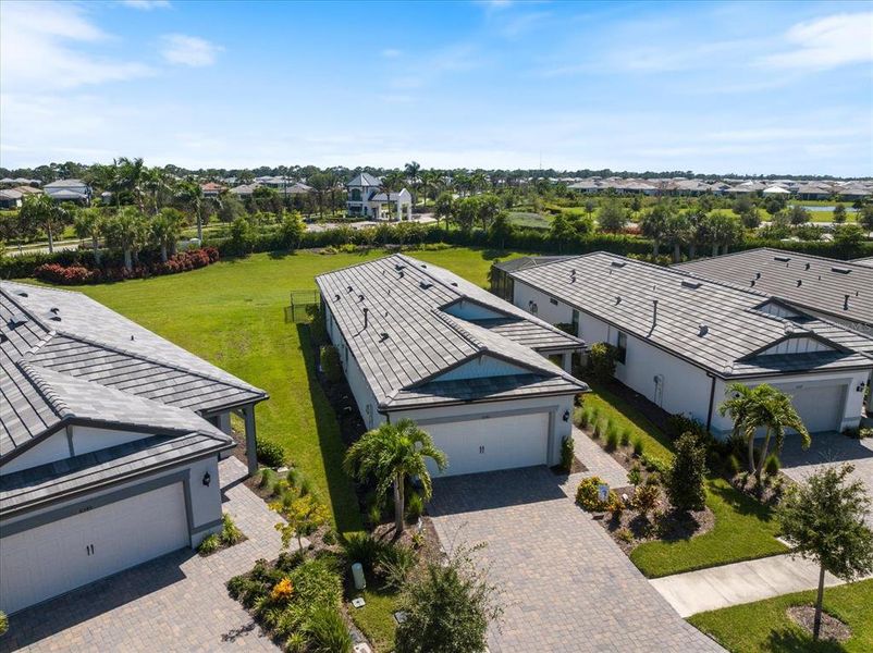 Front exterior of a new home in , Nokomis, FL, highlighting curb appeal (Image 23).