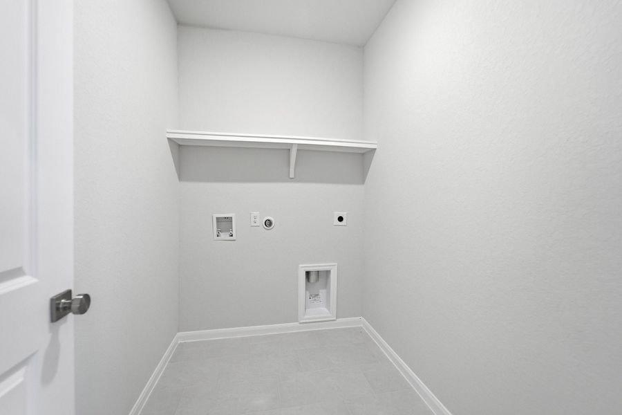 Spacious, unfurnished interior of a new home in The Woodlands at Medina Hills, Mico (Image 20).