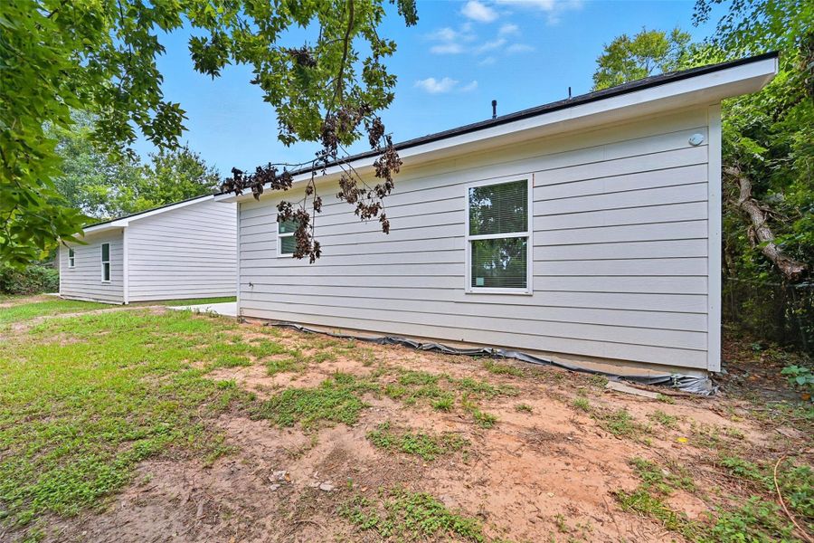 Front exterior of a new home in , Texas City, TX, highlighting curb appeal (Image 1). Front exterior of a new home in , Texas City, TX, highlighting curb appeal (Image 1).