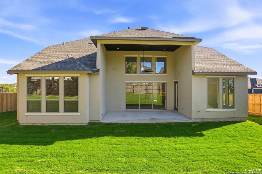 Exterior details and patio area of a home in Kinder Ranch 70's, San Antonio (Image 30).