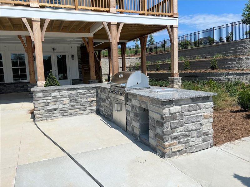 Exterior details and patio area of a home in The Park at Gainesville Township, Gainesville (Image 21).