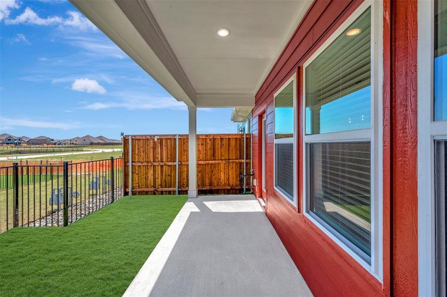 Exterior details and patio area of a home in Providence Commons, Providence Village (Image 2). Exterior details and patio area of a home in Providence Commons, Providence Village (Image 2).