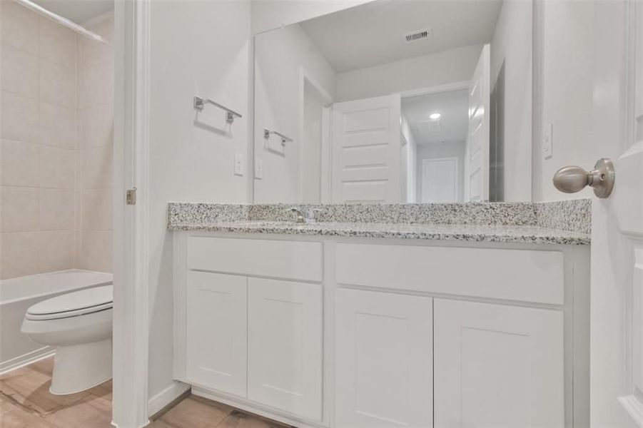 Furnished interior view inside a new home in Lakes at Black Oak, Magnolia (Image 35).