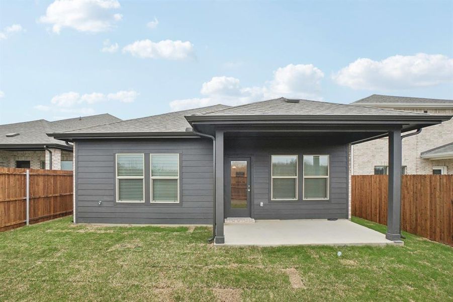 Exterior details and patio area of a home in Parks at Foster Crossing - Spring Series, Anna (Image 4).