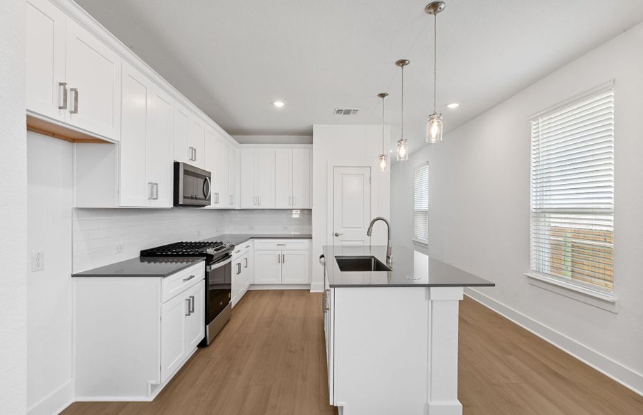 Furnished interior view inside a new home in Crosswinds, Kyle (Image 7).
