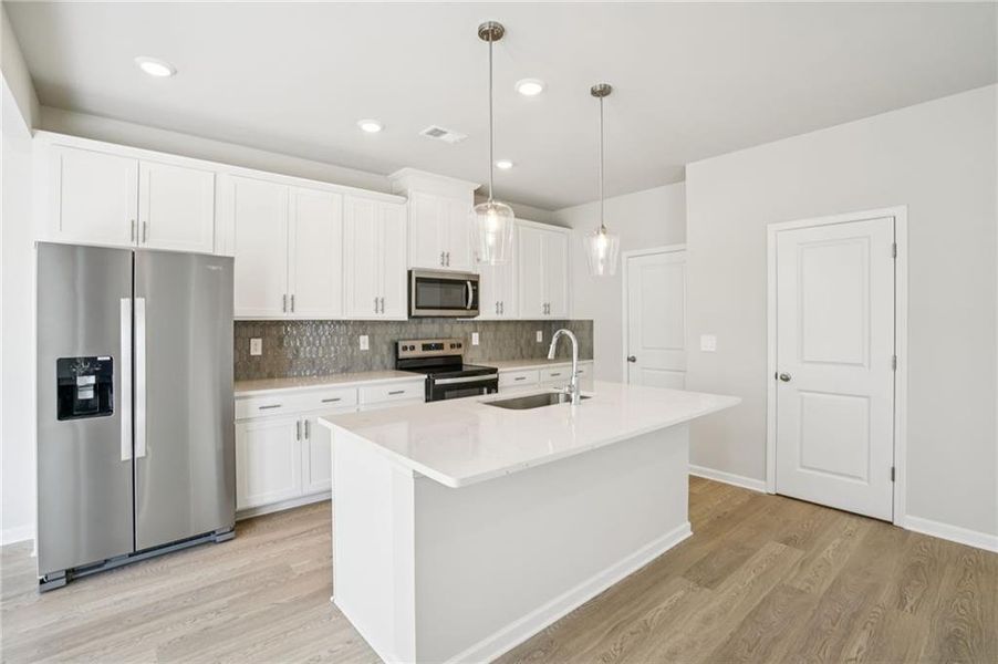 Furnished interior view inside a new home in Hawthorne Station, College Park (Image 7).