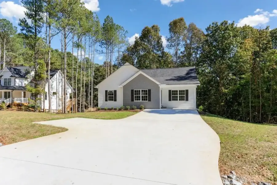 Front exterior of a new home in , Lula, GA, highlighting curb appeal (Image 21).