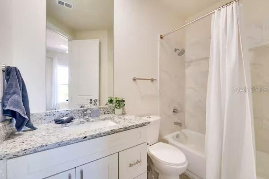 Furnished interior view inside a new home in , Kissimmee (Image 11). Furnished interior view inside a new home in , Kissimmee (Image 11).