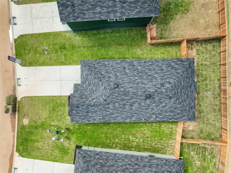 Front exterior of a new home in McCrorey Trails, Conroe, TX, highlighting curb appeal (Image 2).