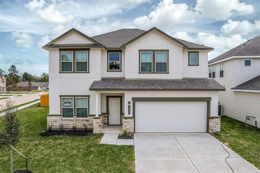 Welcome to this stunning new construction home in Glendale Lakes, Rosharon, TX. This traditional 2-story residence offers a charming exterior with modern touches, featuring a spacious 2-car garage and a well-maintained front yard. The elegant design and quality craftsmanship make this home a standout in the neighborhood. Ideal for family living and entertaining, this home is ready for you to move in and enjoy. Photos are from another Rylan floor plan.