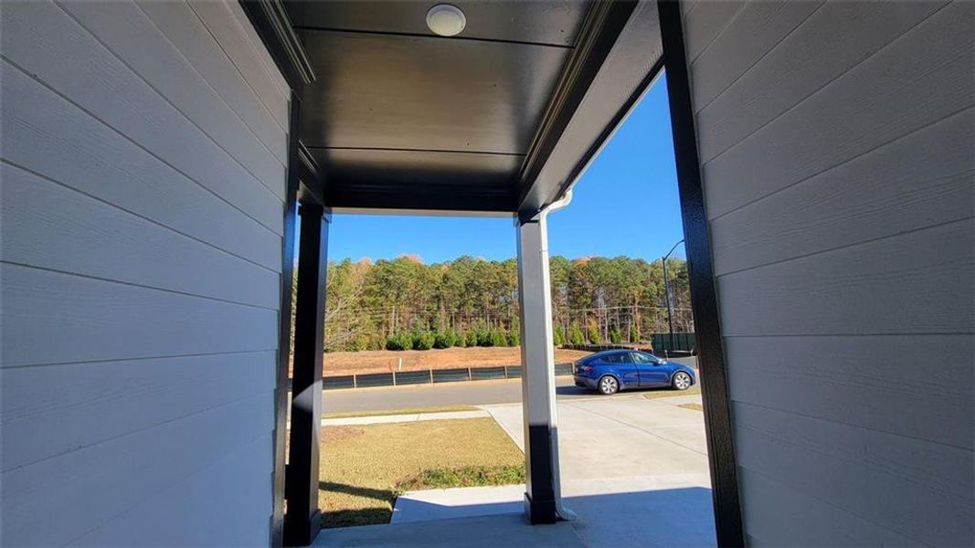 Exterior details and patio area of a home in The Reserve at Bells Ferry, Kennesaw (Image 24).