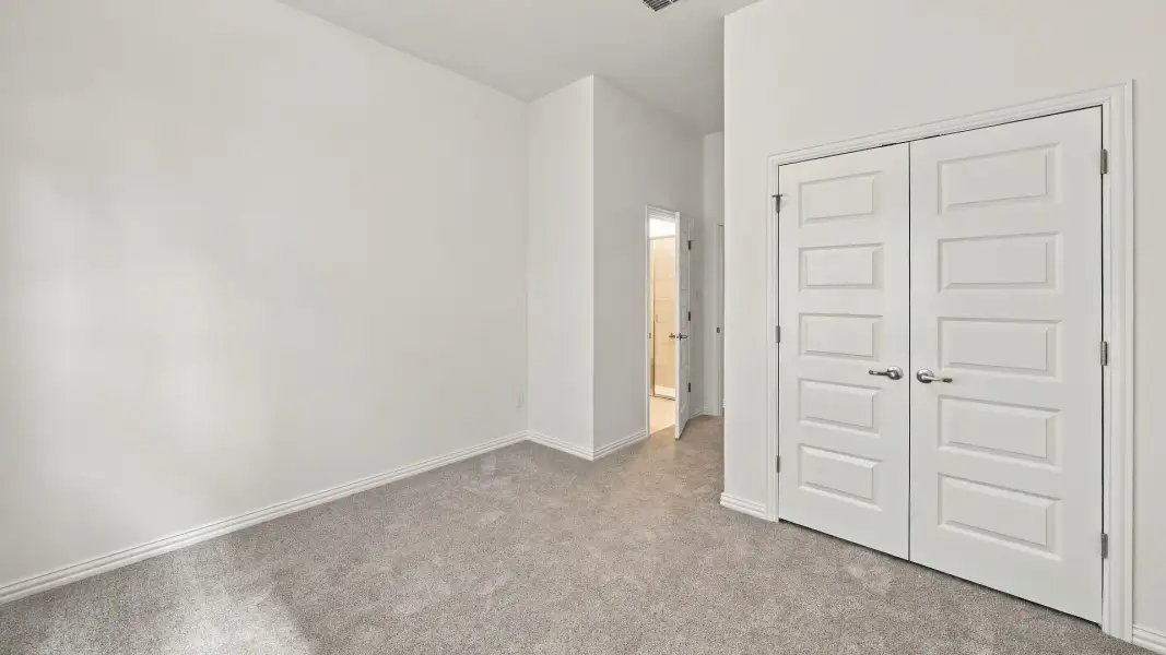 Furnished interior view inside a new home in Carillon, Manor (Image 14).