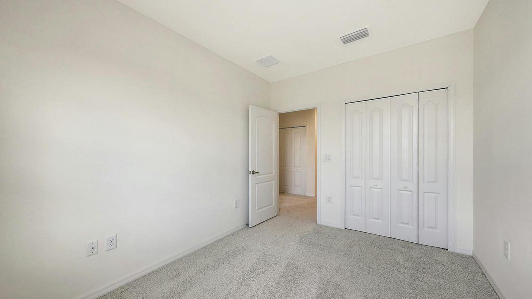 Spacious, unfurnished interior of a new home in Palm Grove Real Estate and Homes for Sale in Lakewood Ranch, FL - Neal Communities, Lakewood Ranch (Image 66).