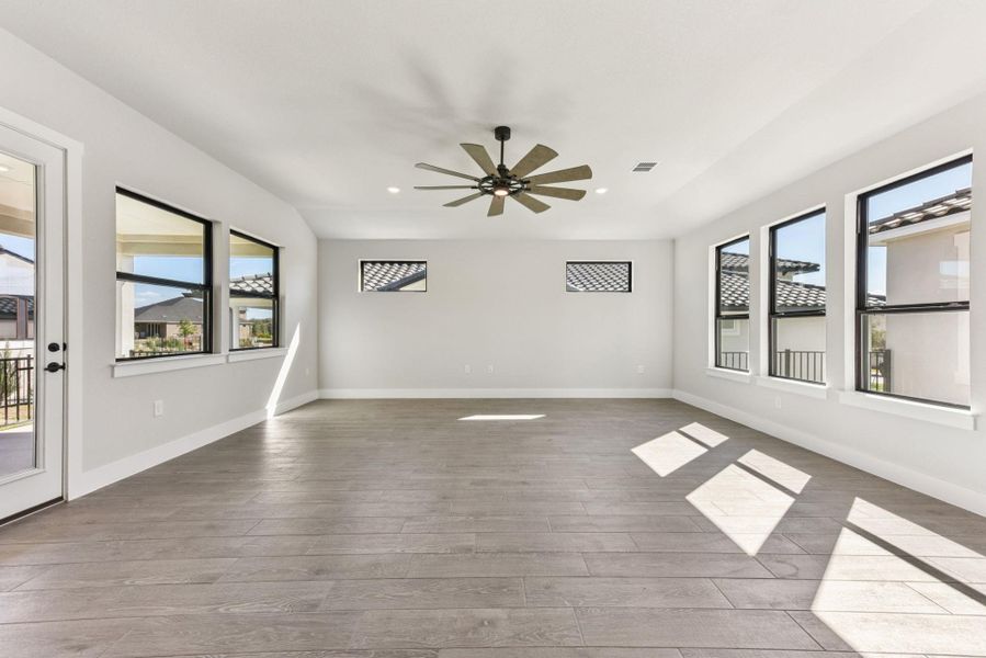 Unfurnished room featuring light wood-style floors and recessed lighting Unfurnished room featuring light wood-style floors and recessed lighting