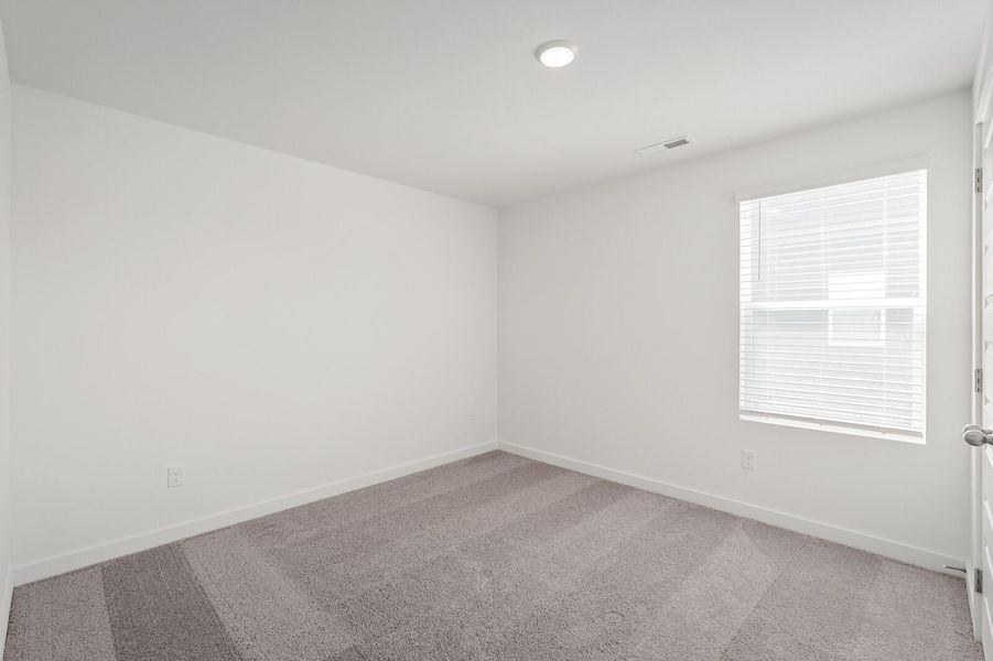 Spacious, unfurnished interior of a new home in Calista Farms, White House (Image 49).
