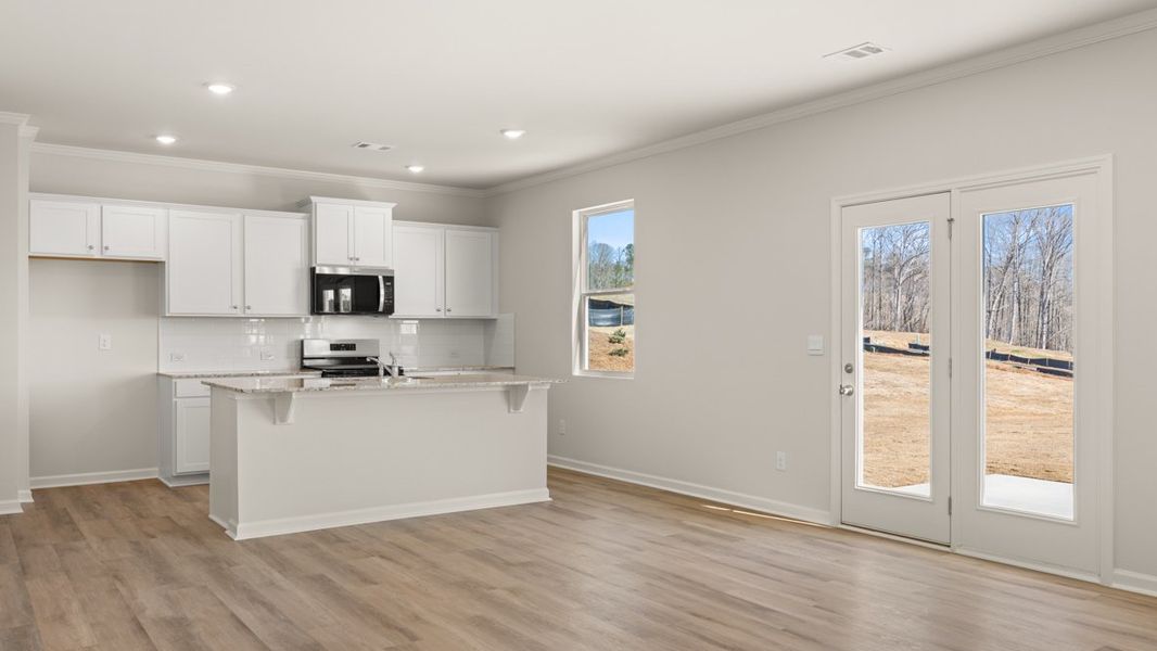 Representative furnished interior of a home built from the Flora by D.R. Horton in Sheffield Highlands, Dallas (Image 6).