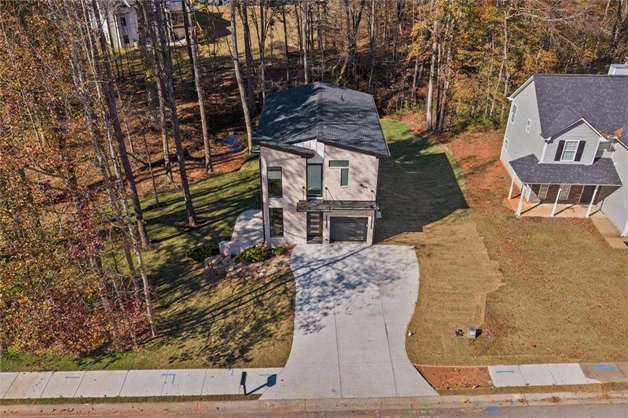 Front exterior of a new home in , Villa Rica, GA, highlighting curb appeal (Image 31).