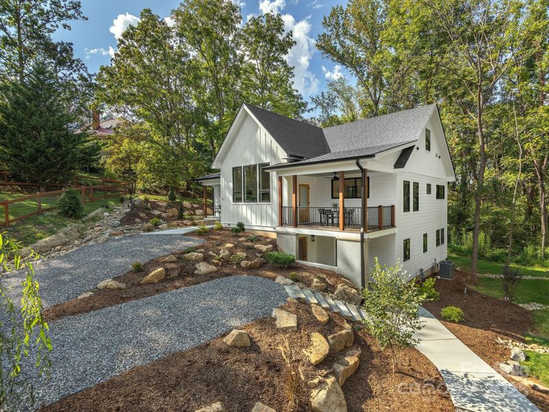 Stunningly brand new construction in DOWNTOWN WEAVERVILLE on private lot for convenient and peaceful living.