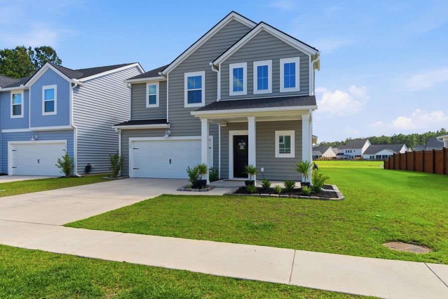 Front exterior of a new home in , Summerville, SC, highlighting curb appeal (Image 20). Front exterior of a new home in , Summerville, SC, highlighting curb appeal (Image 20).