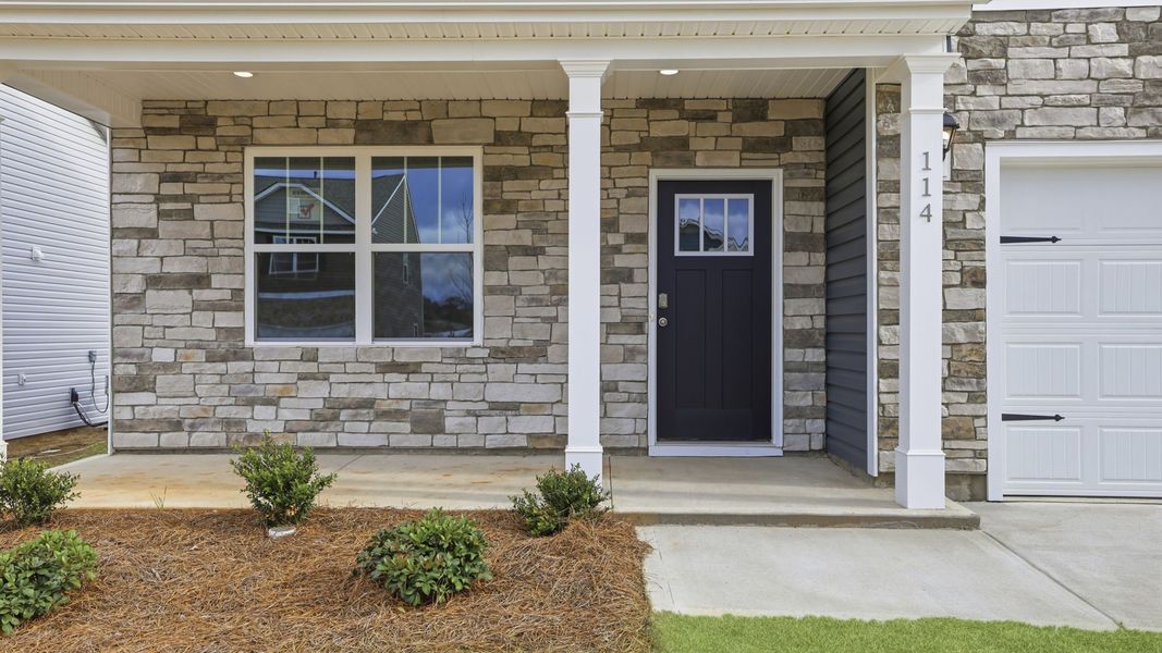 Exterior details and patio area of a home in Durbin Meadows Traditions, Fountain Inn (Image 2). Exterior details and patio area of a home in Durbin Meadows Traditions, Fountain Inn (Image 2).