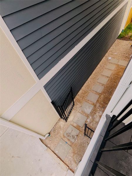 Exterior details and patio area of a home in , Houston (Image 29).