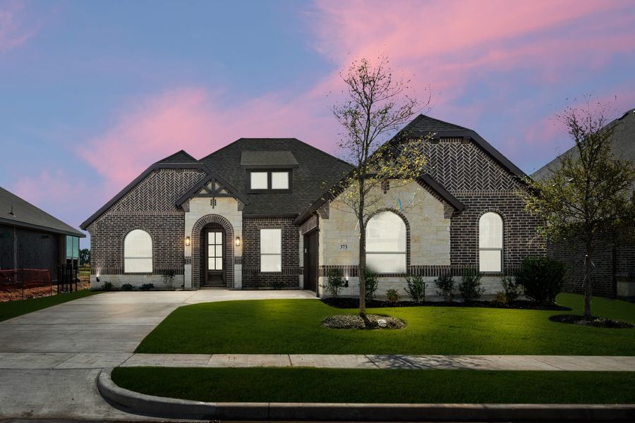Front exterior of a new home in Abe’s Landing, Granbury, TX, highlighting curb appeal (Image 1). Front exterior of a new home in Abe’s Landing, Granbury, TX, highlighting curb appeal (Image 1).