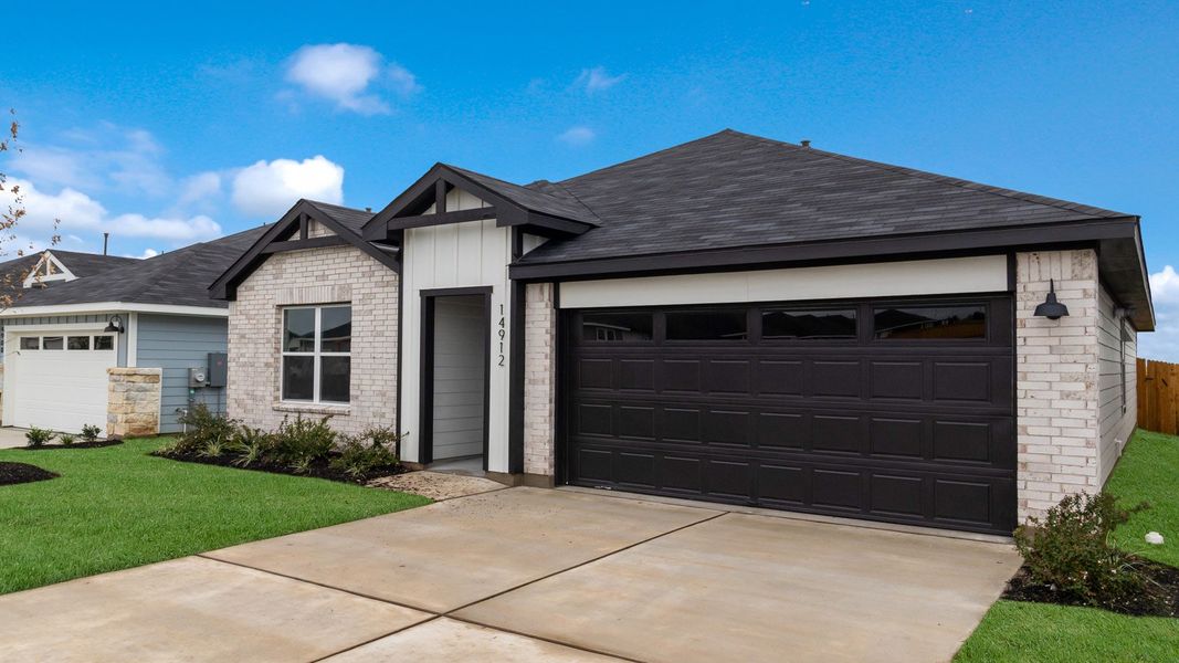 Representative exterior photo of a completed home built from the The Irvine by D.R. Horton in Monarch Ranch, Manor, TX (Image 2). Representative exterior photo of a completed home built from the The Irvine by D.R. Horton in Monarch Ranch, Manor, TX (Image 2).