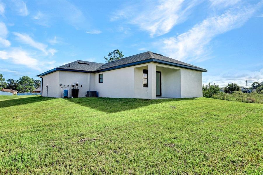 Exterior details and patio area of a home in , Lehigh Acres (Image 13).
