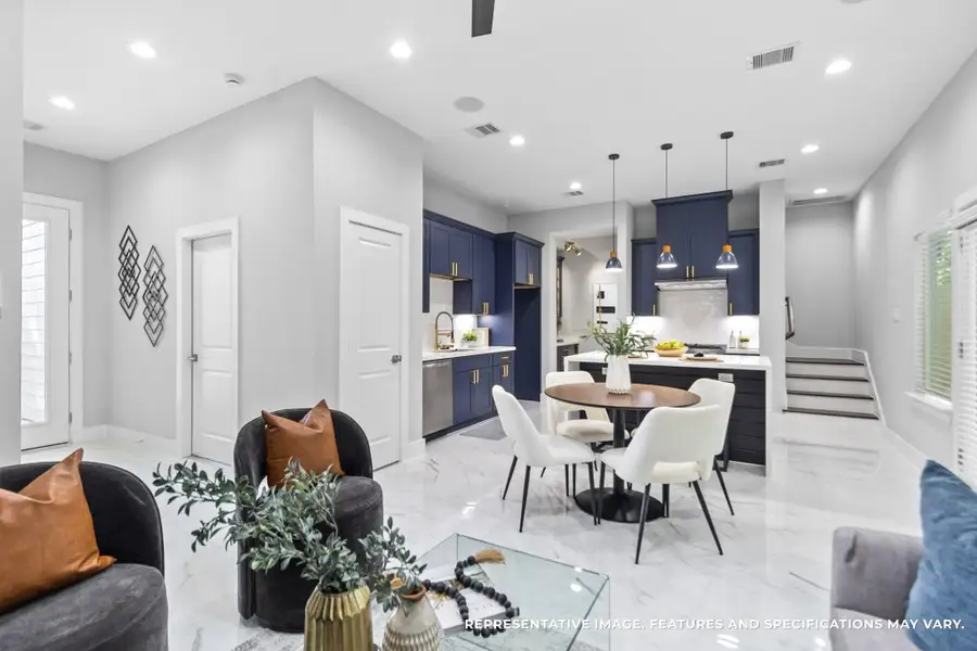 The deep navy cabinetry with gold hardware brings such a sophisticated pop to your kitchen—you can’t help but smile every time you walk in. The deep navy cabinetry with gold hardware brings such a sophisticated pop to your kitchen—you can’t help but smile every time you walk in.