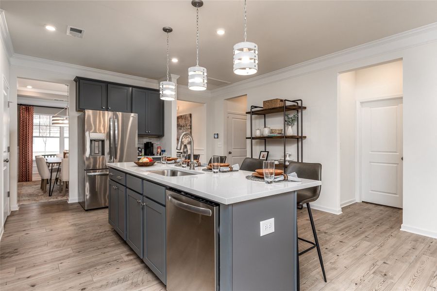 The Palmer- Kitchen. The sample image is a staged model, to be used for illustrative purposes only. Upgrades, options, and colors will vary.