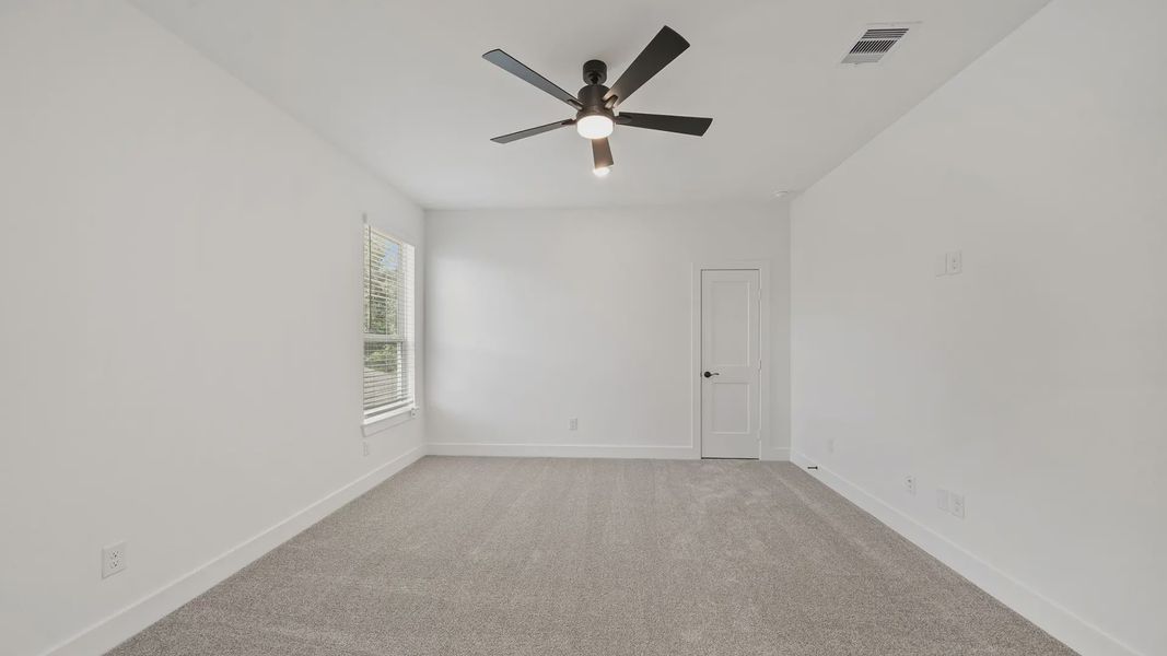 Representative unfurnished interior of a home built from the Waterloo by Chesmar Homes in Attwater 65's, Waller (Image 36).