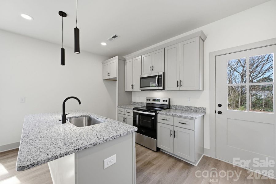 Furnished interior view inside a new home in , Monroe (Image 6).
