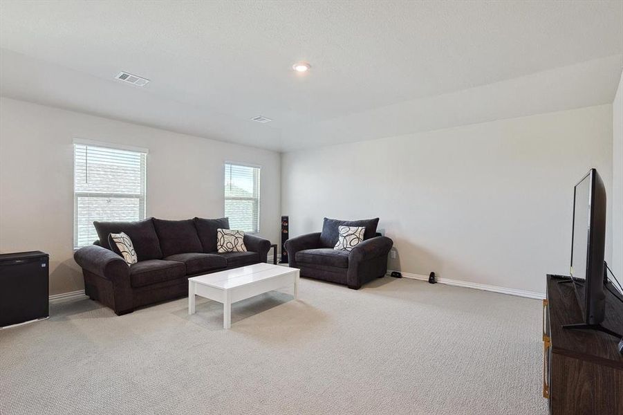 Living room featuring carpet floors