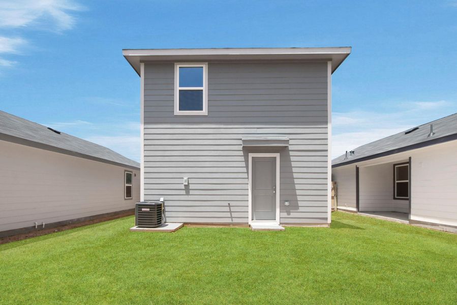 Exterior details and patio area of a home in Baron Village, Conroe (Image 3).