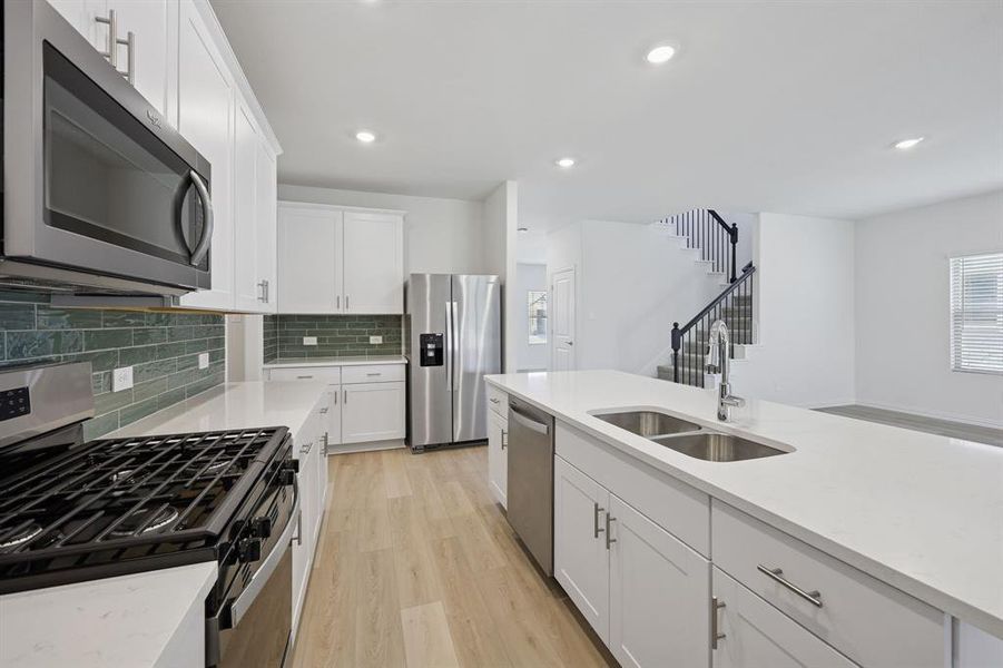 Photo is not of the actual home, but is an inspirational photo of builder’s model home and may depict options, furnishings, and/or decorator features that are not included.