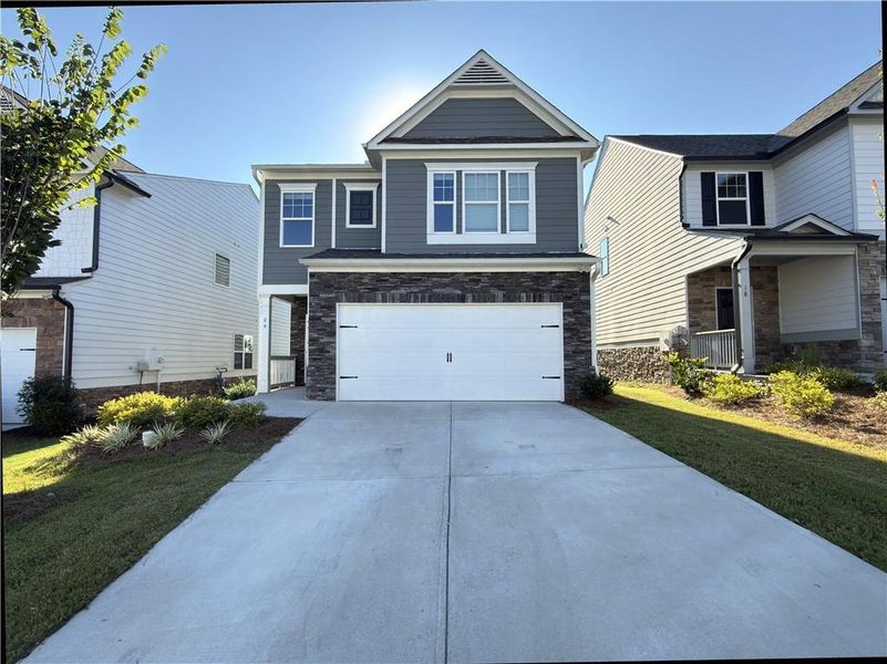 Front exterior of a new home in , Dawsonville, GA, highlighting curb appeal (Image 2). Front exterior of a new home in , Dawsonville, GA, highlighting curb appeal (Image 2).