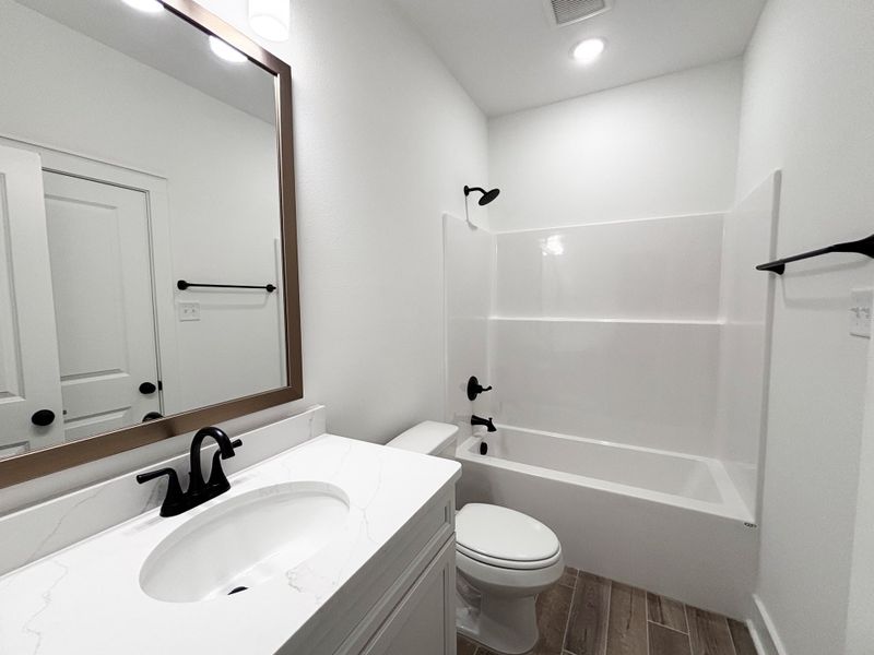 Furnished interior view inside a new home in Bird Song at Hammock Bay, Freeport (Image 12).